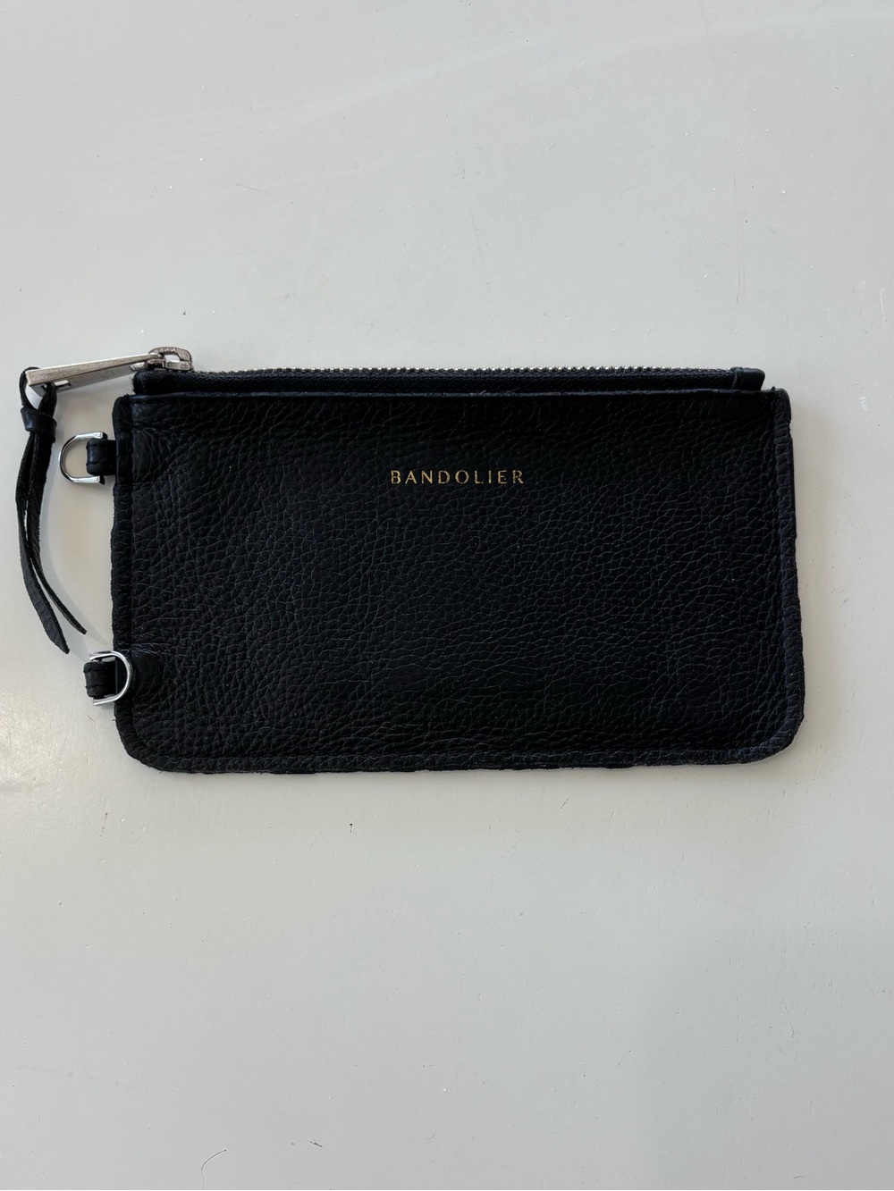 Bandolier Black Pebbled Leather Zip Wristlet with Gold Logo